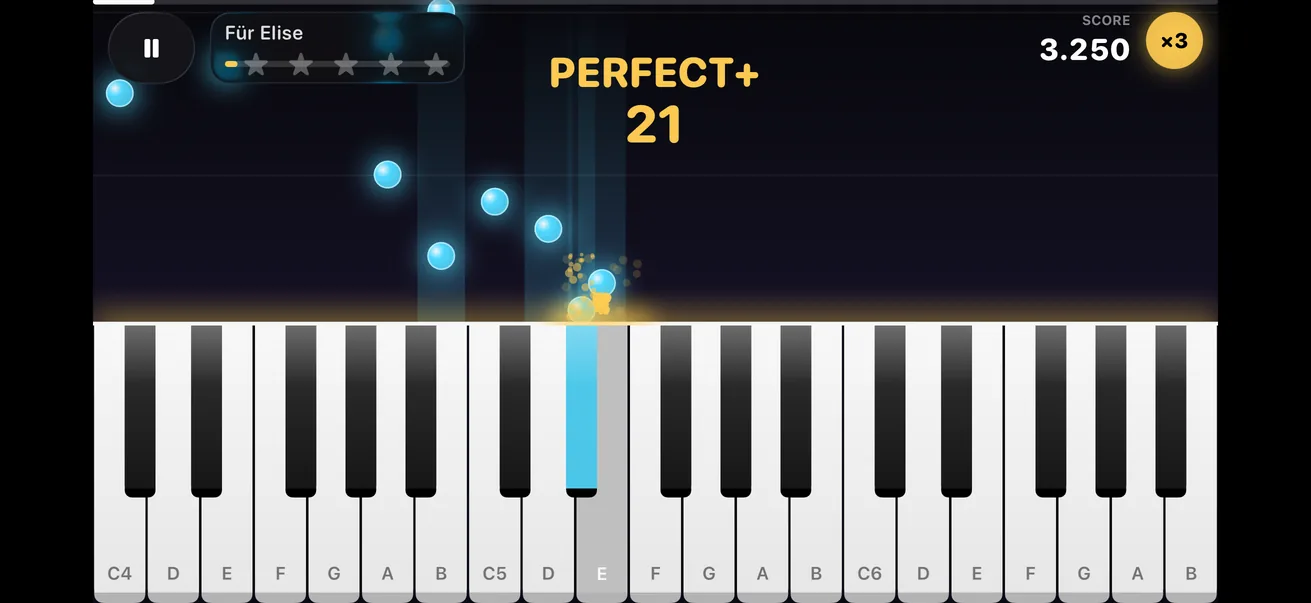 Nota Piano gameplay: notes falling onto the keyboard with PERFECT+ feedback
